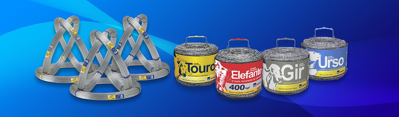 Banner com rolos de arame liso e arame farpado, exibindo embalagens das marcas Touro, Elefante, Gir e Urso sobre fundo azul.