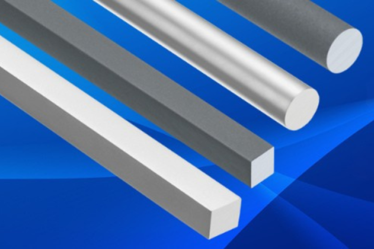 Banner com barras redondas e quadradas em destaque, sobre fundo azul, com o texto “Barras laminadas ou barras trefiladas?”