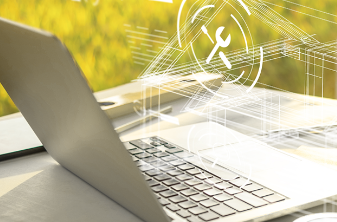 Notebook aberto sobre mesa com fundo verde, exibindo sobreposição de ícones digitais relacionados a ferramentas e tecnologia.